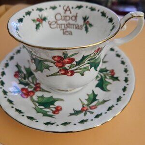 A cup of Christmas  tea teacup and saucer Waldman house 1992
